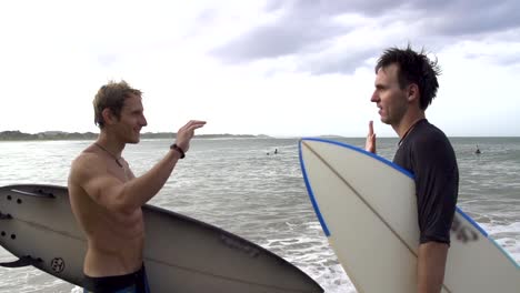 SLOW-MOTION:-Surfers-high-five