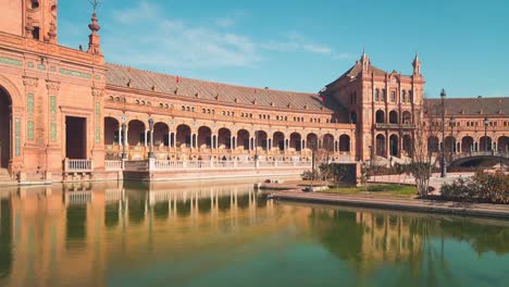 sunny-day-seville-main-palace-of-spain--pond-reflaction-panorama-4k-time-lapse