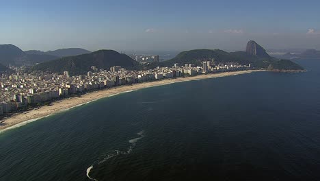 Flying-along-Copacabana-Beach,-Rio-de-Janeiro,-Brazil