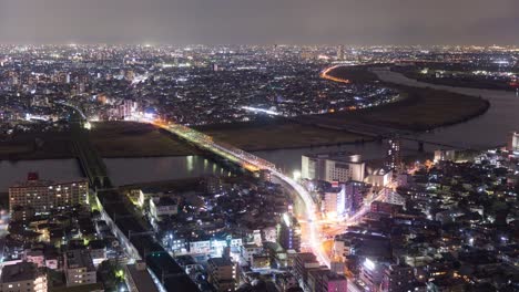 Vista-de-noche-de-la-ciudad-de-Riverside-(Ichikawa-la-ciudad-de-Chiba-y-Edogawa-ku-Tokyo-Japón)