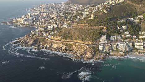 Cape-Town-Aerial-of-Coastline-and-Sea-Point-at-Beach-Sunset
