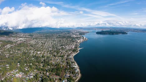 West-Vancouver-BC-Skyline-Aerial-View-Traveling-South-Along-Coastline-Over-Beaches