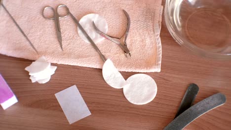 Manicure-tools-on-the-towel-on-table.