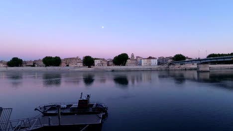 Beautiful-summer-evening-on-the-French-river-Rhone-in-the-city-of-Arles.-Time-lapse.