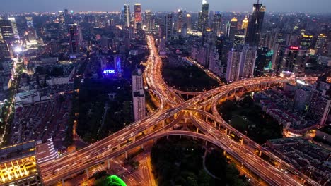 TL,-WS-Rush-hour-traffic-on-multiple-highways-and-flyovers-at-night-/-Shanghai,-China