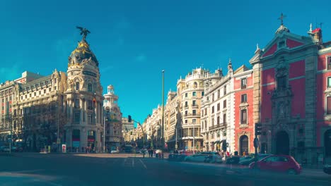 sun-light-gran-via-famous-madrid-metropolis-crossroad-traffic-4k-time-lapse-spain