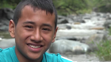 Teenage-Buy-Smiling-at-River