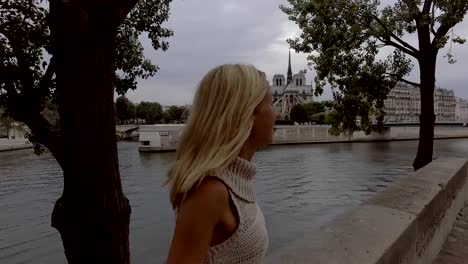 Young-woman-enjoying-Paris-city,-France