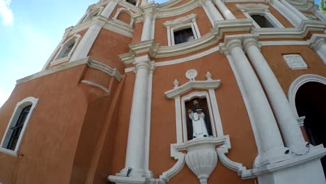 Colonial-16th-century-Spanish-built-of-Saint-Paul-the-First-Hermit-Cathedral,-showing-her-facade.-tracking-shot