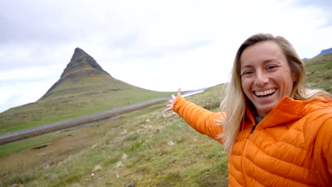 Selfie-portrait-of-tourist-female-in-Iceland-at-Kirkjufell-mountain