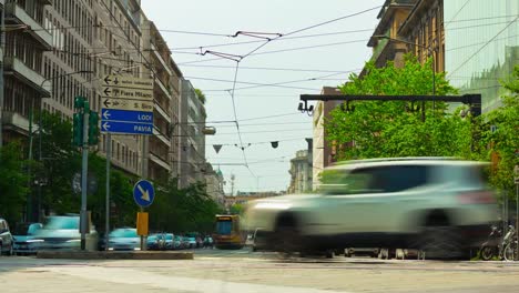 Italy-milan-city-sunny-day-tram-traffic-street-panorama-4k-timelapse