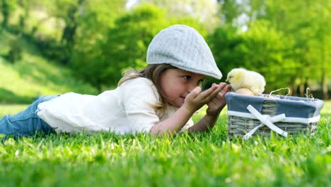 Little-Girl-Playing-with-Chick