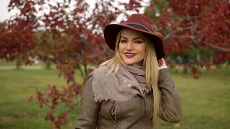 beautiful-blonde-girl-walking-in-the-park