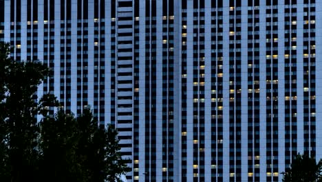 Illuminated-windows-of-hotel-,-time-lapse