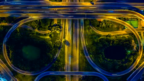 Aerial-view-Time-lapse-of-the-expressway,-motorway-and-highway-in-the-detail-of-circus-intersection