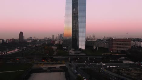 Frankfurt-ECB-Skyline-Aerial-Shot-at-early-sunrise-reflecting-sun