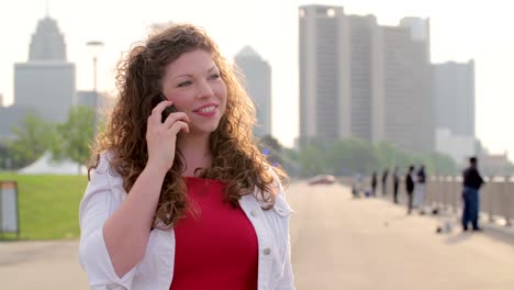 Woman-in-Detroit-listening-to-cellphone