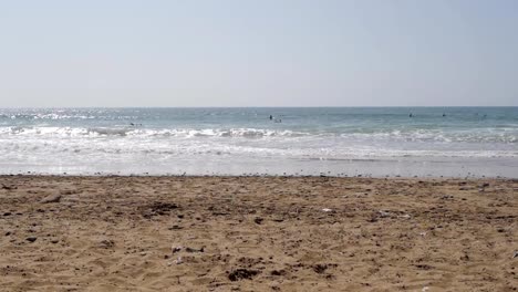 morocco-surfers-waiting-waves-on-beach