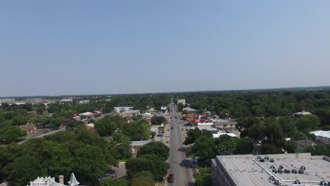 E.-Cesar-Chavez-St,-Aerial-view-of-street-car-traffic---Austin,-Texas,-USA