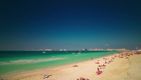 dubai-marina-sunny-day-famous-beach--palm-view-4k-time-lapse-united-arab-emirates