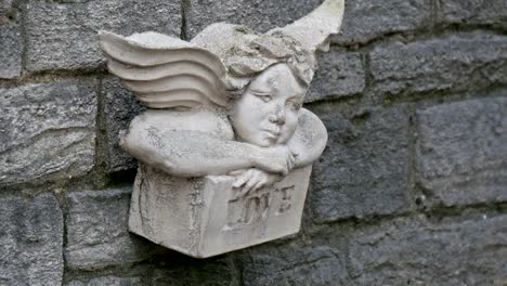 An-angel-sculpture-on-the-wall-of-a-church