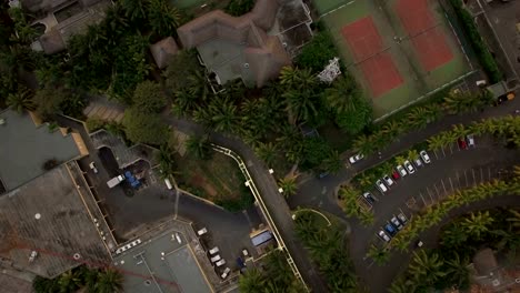 Aerial-shot-of-town-on-the-island-and-blue-ocean,-Mauritius