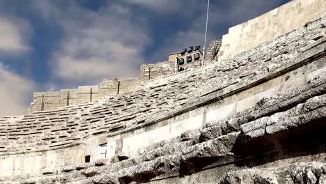 Roman-Theatre-in-Amman,-Jordan----theatre-was-built-the-reign-of-Antonius-Pius-(138-161-CE),-the-large-and-steeply-raked-structure-could-seat-about-6000-people