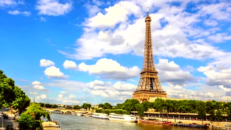 Cruise-Ship-On-Seine-River-By-Buildings-In-City-Against-Clear-Sky