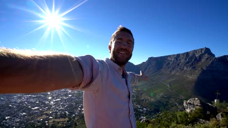 Young-man-taking-selfie-portrait-in-Cape-Town