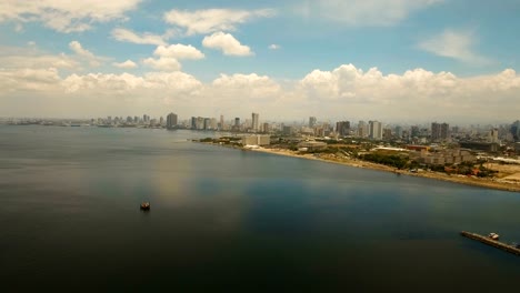 Aerial-city-with-skyscrapers-and-buildings.-Philippines,-Manila,-Makati