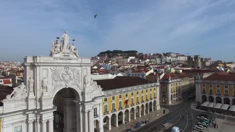 Flying-in-Praca-do-Comercio,-Lisbon,-Portugal