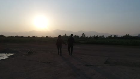 Young-couple-happy-walking-in-the-evening.