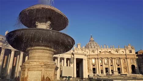 The-famous-Fountain-of-San-Pietro-Italian-square-with-Saint-Peter-church-columns,-in-Rome,-Italy