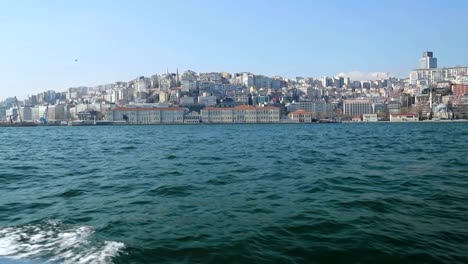 Old-and-new-Istanbul-view,-view-from-sailing-boat,-awesome-overbuilt-coastline