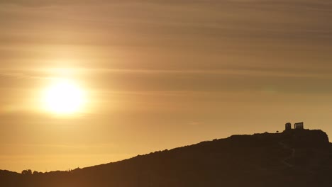 Greek-temple-of-Poseidon-at-sunrise,-Cape-Sounio