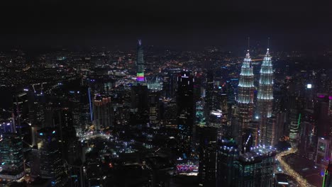 night-illumination-kuala-lumpur-cityscape-downtown-aerial-panorama-4k-malaysia