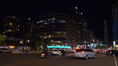 noche-iluminada-Taipei-ciudad-tráfico-calle-panorama-4k-Taiwán