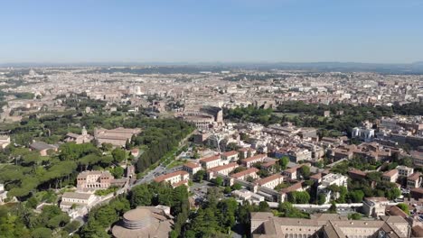 Aerial-Flying-a-drone-over-the-Colosseum-in-Rome,-Italy.-Coliseum-or-Flavian-Amphitheatre-or-Colosseo-oval-amphitheatre-centre.