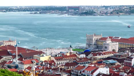 Bird-view-of-Lisboa-downtown.-Baixa-rooftops-with-the-Commerce-square-and-Tagus-river-at-the-background.-Portugal-timelapse