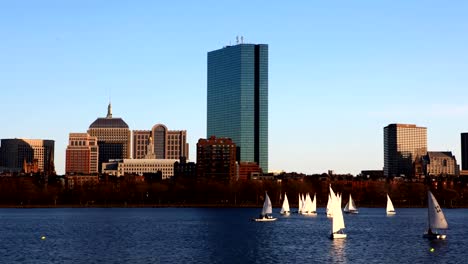 Timelapse-Boston-city-center-with-sailboats-in-front