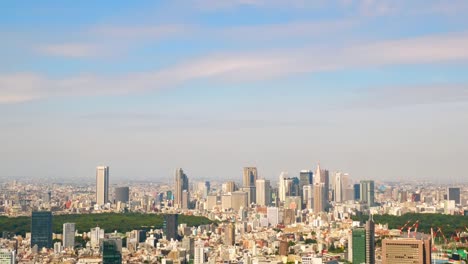 Skyscrapers-and-early-autumn-sky-in-Shinjuku,-Japan-(-Timelapse-video-zoom-out-)