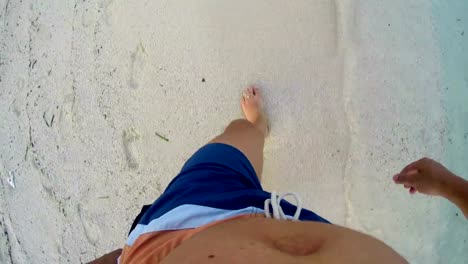 4k-lost-man-walking-on-sand-with--footsteps-in-sand,-POV-from-above