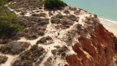 Aerial-footage-of-Falesia-Beach-(Praia-da-Falesia)-in-Algarve,-Portugal