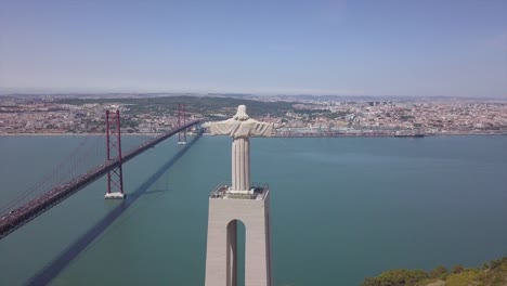 portugal-sunny-day-lisbon-city-christ-the-king-famous-monument-aerial-panorama-4k