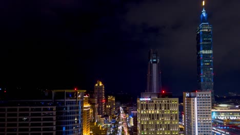 night-illuminated-taipei-cityscape-famous-tower-aerial-panorama-4k-timelapse-taiwan