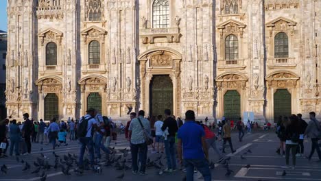 Italy-sunset-time-milan-famous-crowded-duomo-cathedral-front-slow-motion-panorama-4k