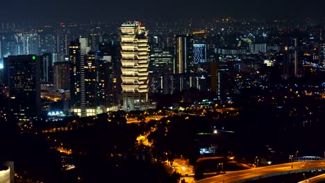 Downtown-Singapore-City-in-Marina-Bay-area.-Financial-district-and-skyscraper-buildings.-Aerial-view-at-night.