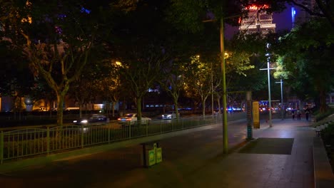 night-illuminated-shanghai-city-traffic-street-sidewalk-panorama-4k-china