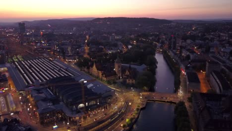 sunset-illuminated-zurich-city-center-riverside-aerial-panorama-4k-switzerland