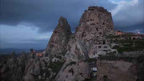 4K-UHD-Day-to-night-time-lapse-of-Uchisar-in-Cappadocia,-Turkey-during-sunset